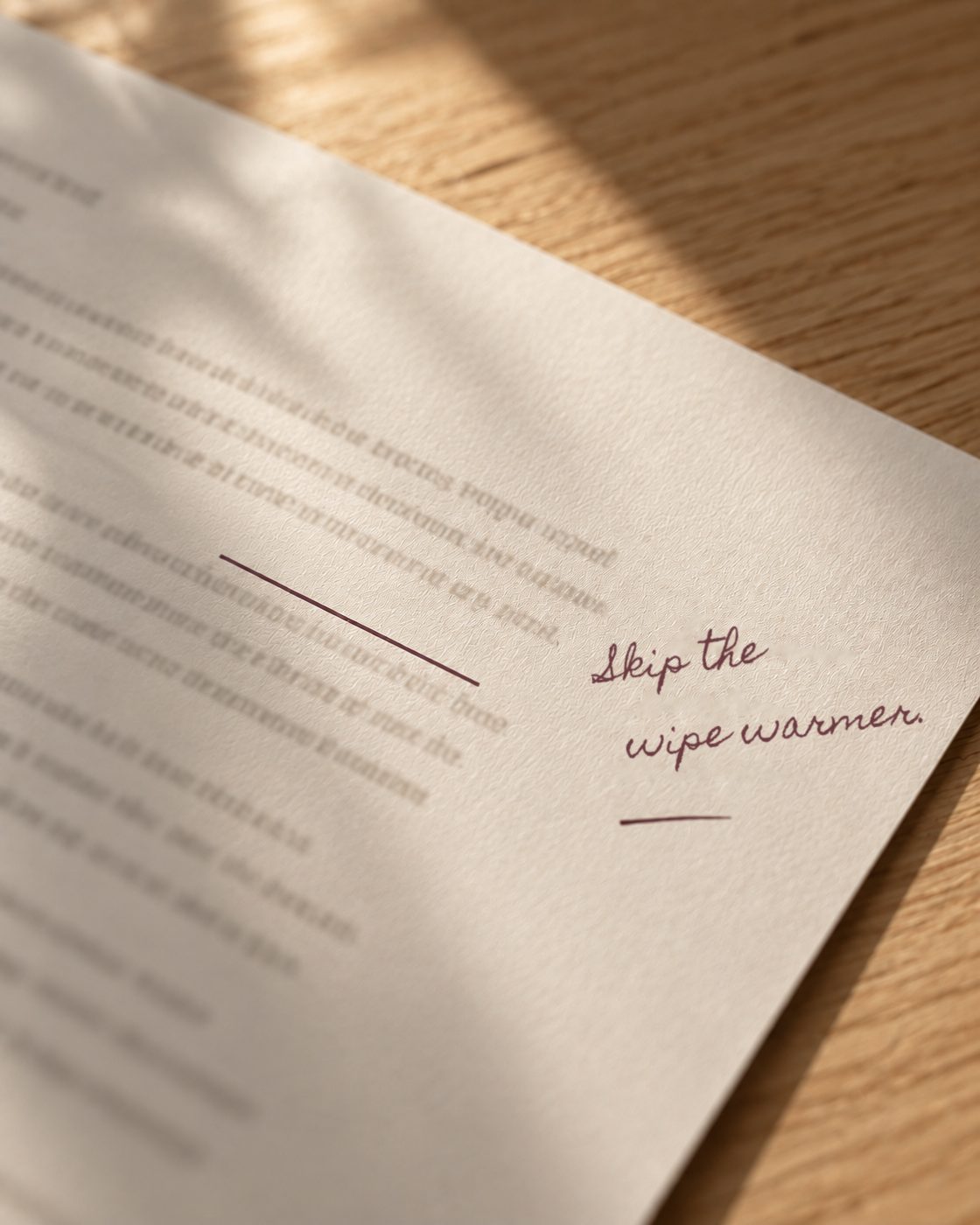 A printed plan with a handwritten note in the margin: Skip the wipe warmer.